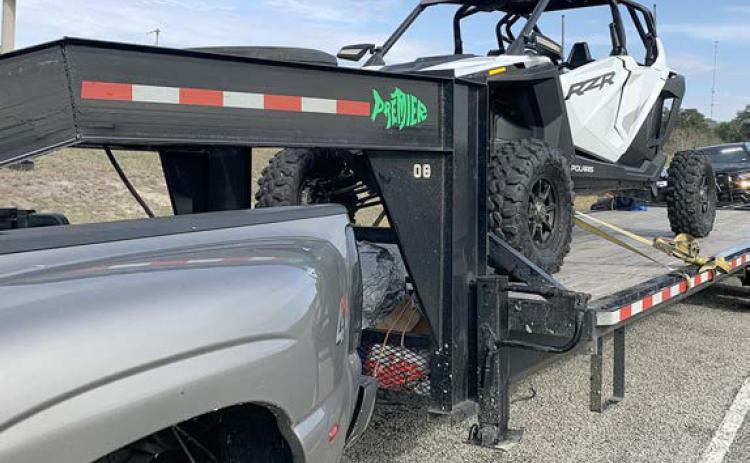 A POLARIS RZR REPORTED AS STOLEN out of Jonesboro, Arkansas was located during a traffic stop on I-10 near Flatonia. The Polaris was on a trailer being pulled by a 2006 gray GMC 3500 dually.