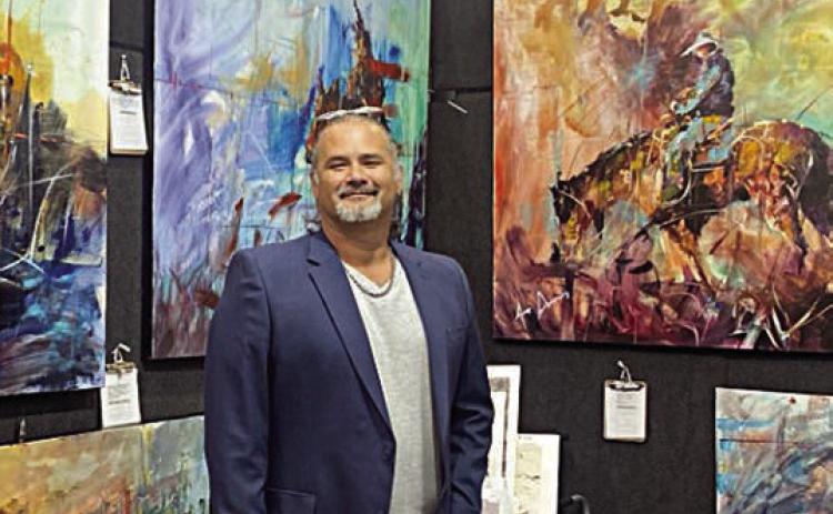 Jeremy Serna’s bold and colorful artwork will be on display at the Arts for Rural Texas Ross Gallery in Fayetteville from Feb. 24 to April 13. Serna is pictured above in front of some of his paintings. An example of his work appears at right.