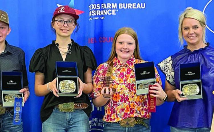 Champion Junior Team – (from left) Holden Holub, Tatum Fritsch, Kaisley Janecka, coach Kaci Carrales and (not shown) Abraham McBride. Holden Holub and Abraham McBride are members of the Schulenburg 4-H.