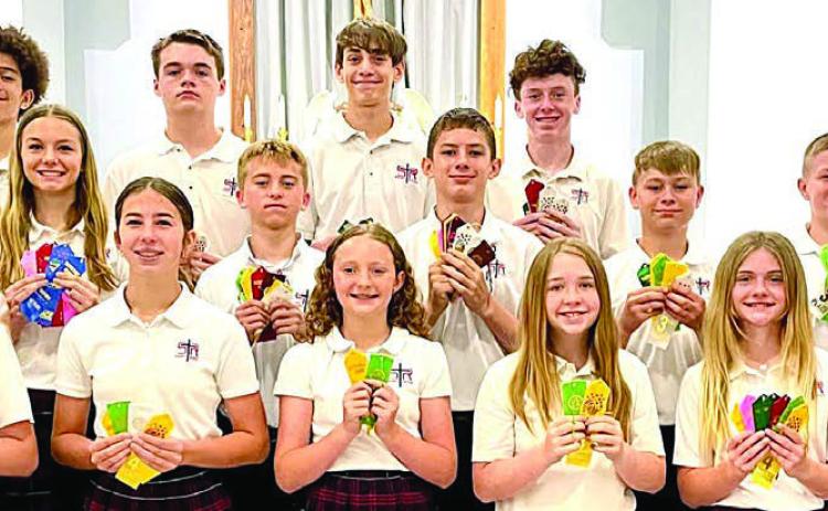 Grades 7 & 8 – (front row, from left) Saybra Pinney, Courtney Magliolo, Caroline Bartek, Reese Dusek, Mallory Bonner, Layney Connor, (second row) Miranda Bonner, Layne Besetzny, Weston Hollas, William Eudy, Brett Hollas, Bo Brossmann, Jenna Guentert, (back row) Denver Carr, Brock Seger, Adam Schramek and Charlie Shank.