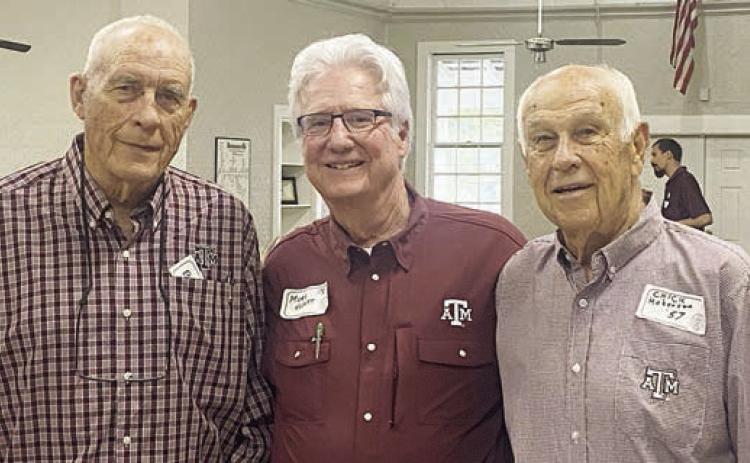 First in the meal line were those from the oldest class – Vernon L. “Chick” Hohensee of Fayetteville (right, class of 1957) and William L. “Bill” Appelt of Hallettsville (left, class of 58). Also shown is Mark Hebert (center, class of 1978).
