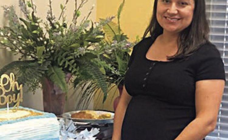 MeMBer JessicA AnDers, who is expecting a child next month, was showered with love at the September meeting of the Literary Club