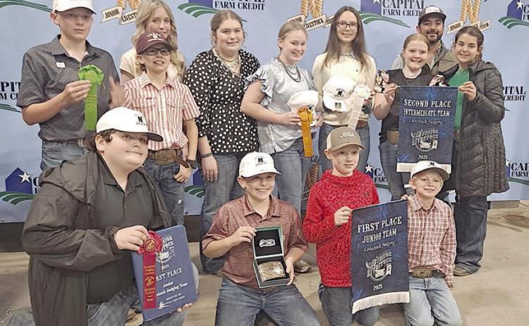 Fayette County 4-H members participating in the Nueces County Livestock Judging Contest were (front row, from left) Rilan Karisch, Hudson Holub, Jehnsen Janecka, Joe Carrales, (back row) Holden Holub, Tate Fritsch, Hailey Janish, Rheagan Karisch, Julie Melton, Tatum Fritsch, Kaisley Janecka, coach JoJo Carrales and Adalyn Carrales.