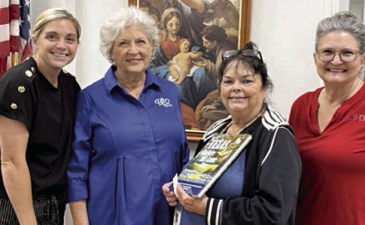 Texas Before the Lone Sta r was donated to St. Rose of Lima Catholic School by the John Everett Chapter of the Daughters of the American Revolution. Shown are (from left) Taylor Jensen, St. Rose principal; Connie Dittrich, DAR chapter historian; Doris Bujnoch St. Rose librarian; Donna Pustejovsky, DAR literacy chair.
