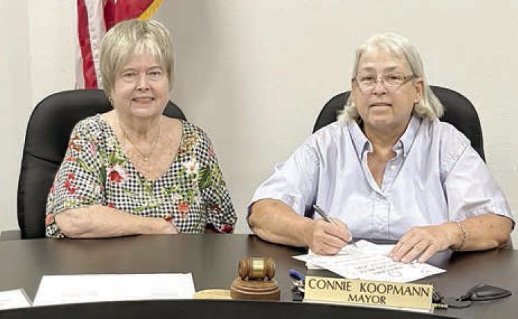 A proclamation designating June 1-7 as National Garden Week in Schulenburg was signed by Mayor Connie Koopmann (second from right), with Schulenburg Garden Club members (from left) Janet Murphy, Bonnie Baker and (right) Debbie Behlen in attendance.