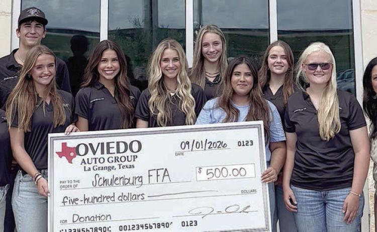Gold level sponsor Oviedo Auto Group-La Grange – (from left) Lilly Wotipka, FFA chaplain; Koi Prihoda, FFA student advisor; Miranda Bonner, FFA FFA reporter; Morgan Steinhauser, FFA president; Jenna Guentert, FFA secretary; Kimber Bartosch, FFA historian; Natalia Garcia, FFA vice president; Kerr McBride, FFA treasurer; Jolene Jarvis, FFA sentinel; and Erika King, Oviedo sales manager.
