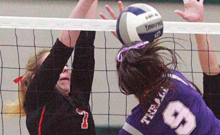 Kloe Kutac sends back a Thrall attack in game three Saturday. Sticker Photo By Layne Vyvjala