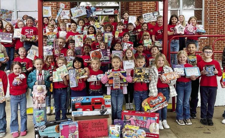St. Rose classes donate to PAT , Deputy Santa