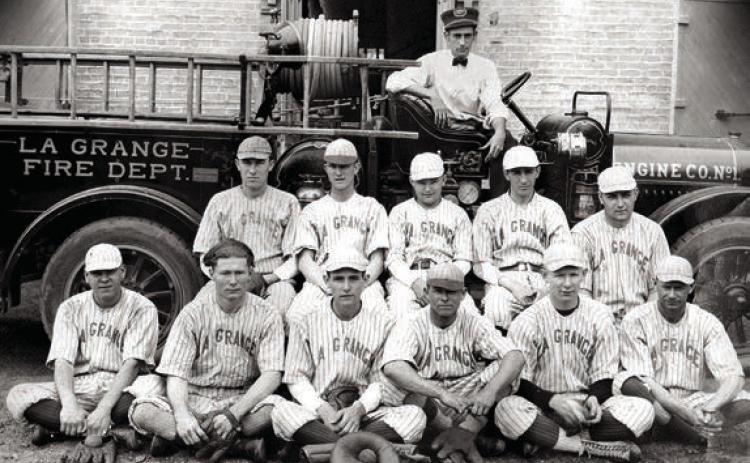 La Grange baseball team posed in front of a fire engine, probably from the 1920s. – Courtesy of Fayette Heritage Museum &amp; Archives