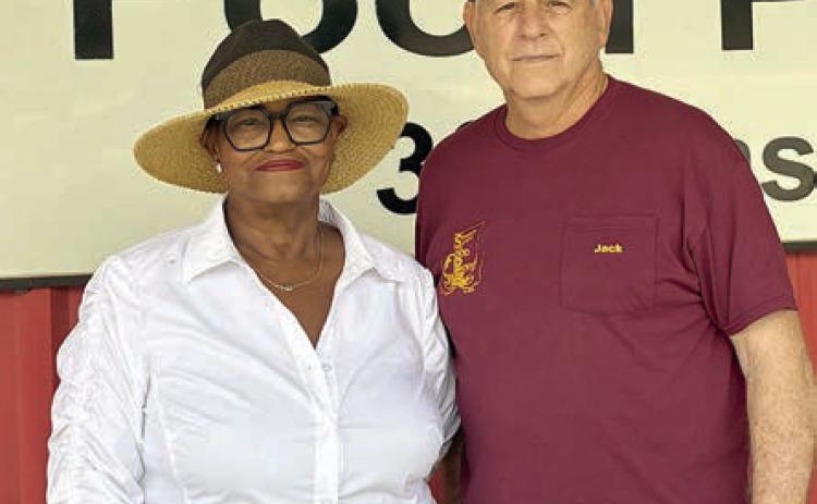 Schulenburg Area Food Pantry – (from left) Jacqueline Figg, NVCW, with Jack Niesner, Schulenburg Area Food Pantry.