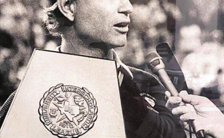 David Husmann gives an interview while holding the state championship trophy following the Shorthorns’ 35-20 win over Goldthwaite in the 1992 Class 2A title game played in the Astrodome.