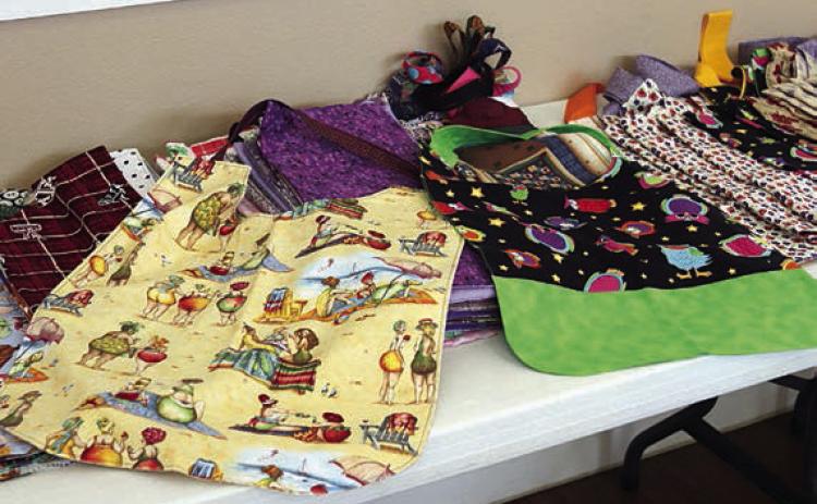 A total of 153 more adult shirt protectors were brought by members to the Colorado Valley Quilt Guild meeting.