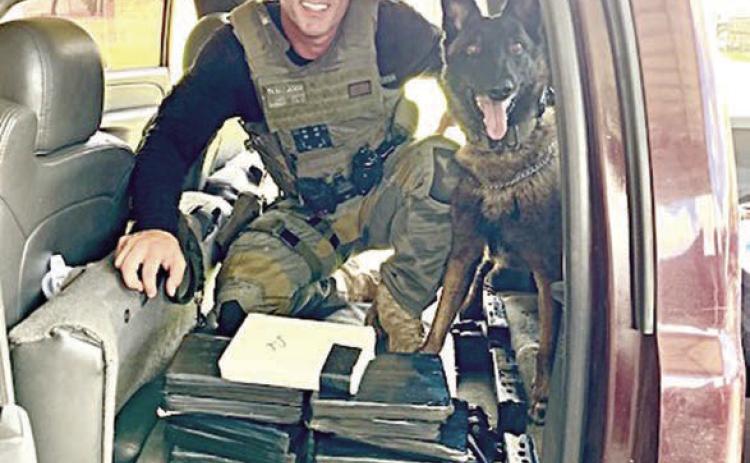 During a traff ic stop on I-10 at Flatonia, Sgt. Randy Thumann and K-9 Kolt located 13 kilos of Fentanyl in the rear seat back and speaker box of a Chevrolet Silverado.