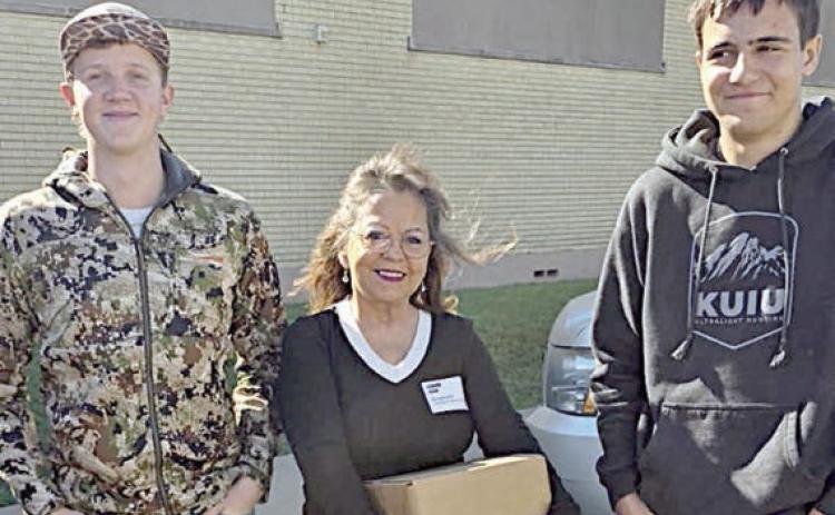Presentation at Schulenburg High School – (from left) Tayt Wenske, Reneemarie Hranicky-Navidad Valley CattleWomen member and Jayden Olmos.