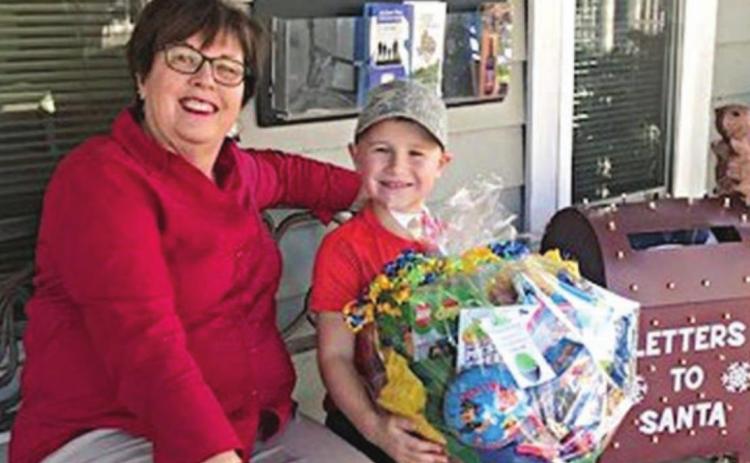 Gift Basket Winner – Brody Brossmann, shown with Terri Wagner (left), Chamber executive director.