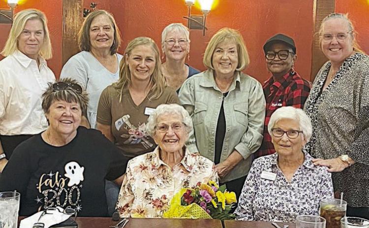 Elsie Farek was surprised by the Navidad Valley CattleWomen members at a recent meeting with the announcement that the collegiate scholarship was being named in her honor. Shown are (front row, from left) Sandi Warnken, Elsie Farek, Zoe Justiss, (back row) Meg Keilbach, Janet Spies, Caitlin Koliba, Jackie Harker, Kay Gibson, Jacqueline Figg and Susie Shank.