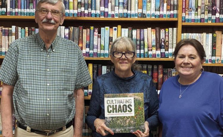 Garden Club donates book to library