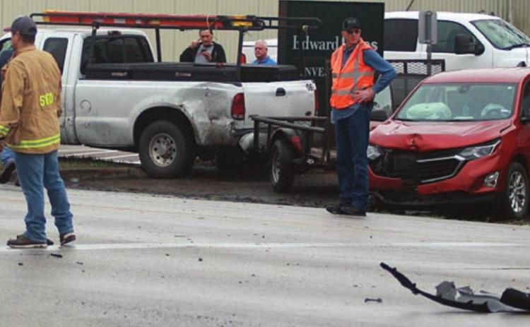 Two injured in three-vehicle mishap