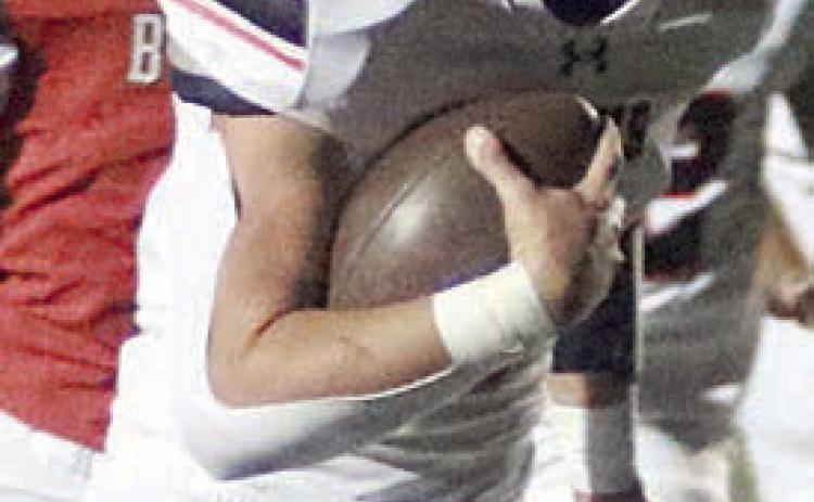 Aaron Janecek heads to the end zone on a 14-yard carry to put the Horns up 14-7. Sticker Photo By Layne Vyvjala