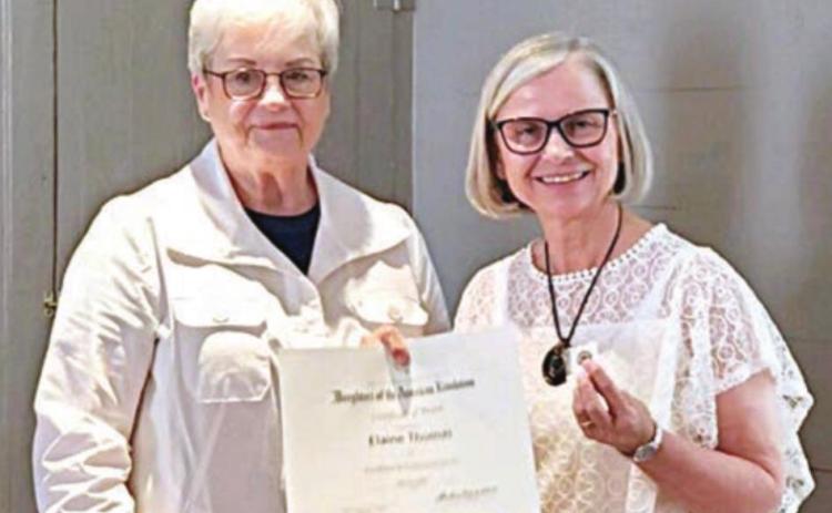 NSDAR COMMUNITY SERVICE AWARD recipient was author Elaine Thomas (right), shown with regent Sue Lane McCulley (left).