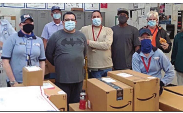 Schulenburg Post Office personnel include: (front, from left) Lisa Mederos, Frank Aguilar, Vicki Schrader; (back, from left) Ronny Supak, Phillip Bludau, Troy Barta, Marcus Coleman, Doug Stewart, and Keri Matejek.