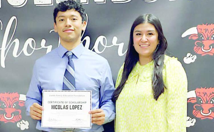 Nicolas Lopez (left), Schulenburg HIgh graduate, was selected to receive the 2024 Clark Scholarship. Presenter was Melanie Ramirez (right), Stanzel Family Foundation program director. The Stanzel Family Foundation partners with the Landa Family Educational Foundation in administering the scholarship.