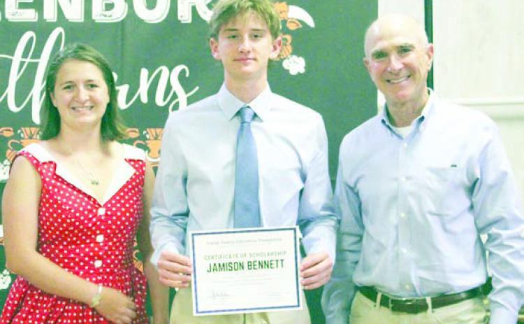 Jamison Benn ett (center), Schulenburg High graduate, was selected to receive the 2026 Clark Scholarship. Presenter was John C. Landa Jr. (right), Landa Family Education Foundation president, and also on hand was Liberty Killion (left), 2021 Clark Scholar. The Landa Family Educational Foundation partners with the Stanzel Family Foundation in administering the Clark Scholarship.