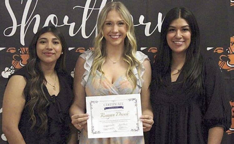 Reagan Dusek (center), Schulenburg High graduate, received the Ginger Stanzel Bosl Memorial Scholarship for 2026. On hand for the presentation were Melanie Ramirez (right), Stanzel Family Foundation program director, and Ruby Rodriguez (left), 2025 Ginger Stanzel Bosl Scholar.