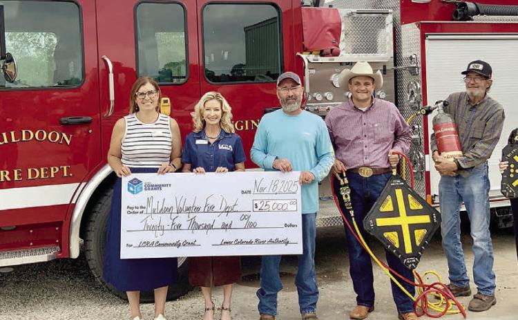 A new brush truck and resc ue equipment will be purchased by the Muldoon Volunteer Fire Department with the assistance of a $25,000 grant awarded through the LCRA Community Grants program. Shown are (from left) Melissa K. Blanding and Margaret D. “Meg” Voelter, LCRA board members; Stephen Kelly, Muldoon VFD president and fire chief; Craig Moreau, public information officer and firefighter; Herbert Hart, firefighter; and Kate Ramzinski, LCRA regional affairs representative.