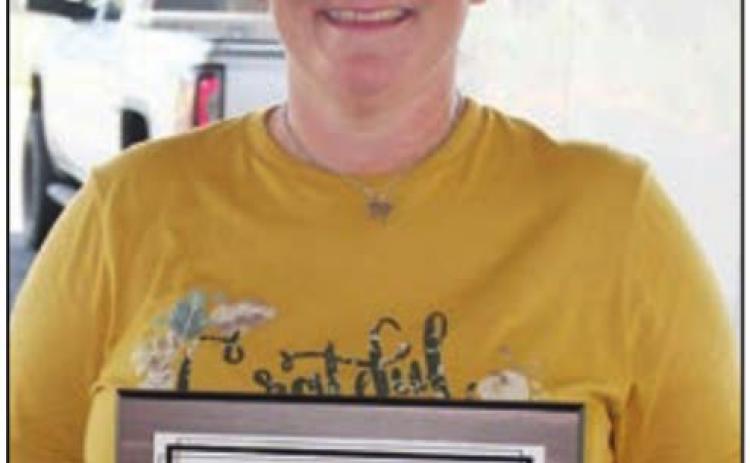 Best In Show – Weimar ISD Misty Mican accepts the award, for the top tastefully-themed tablescape, on behalf of Stacey Heger and Lindsay Fisbeck. Sticker Photo By Darrell Vyvjala