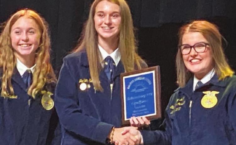 Golden Horizon – The Schulenburg FFA was recognized as one of the top chapters in the state with the designation of Golden Horizon Gold Emblem Chapter. Accepting the award were (from left) Harly Zapalac and Jordan Sommer.