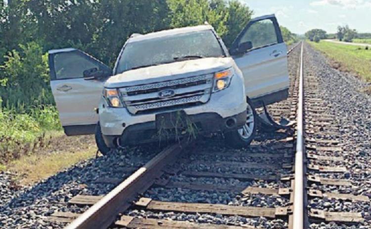 Chase through town ends on tracks