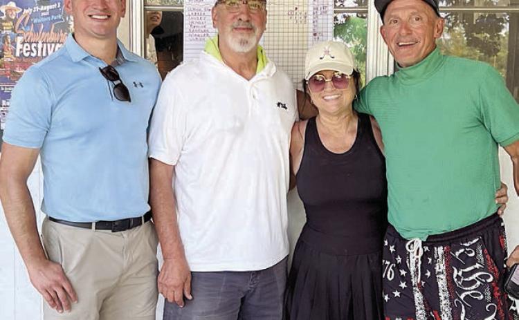 First Flight, 1st Place (10 under par / 62) – (from left) Montana Olle, Mike Olle, Jamie Mikulik, and John Mikulik.