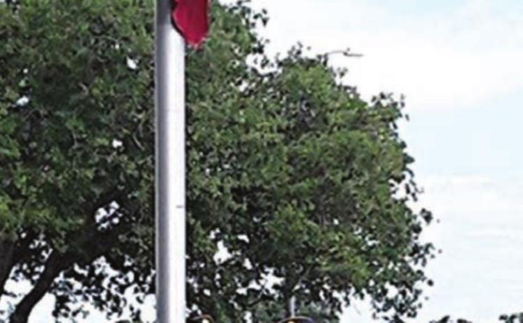 Post 143 members raise flags at Slavnost