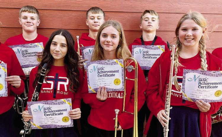 The following students attained first chair in their sections of the St. Rose of Lima Catholic School band program for November – (front row, from left) Caroline Bartek, percussion; Elly Wotipka, clarinet; Mallory Bonner, trombone; Brynlee Berger, flute; (back row) Bo Brossmann, baritone; Brett Hollas, trumpet; Weston Hollas, alto saxophone; and Holden Holub, tenor saxophone.