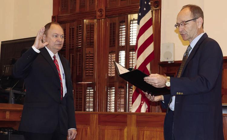 Mueller sworn in as Fayette County judge