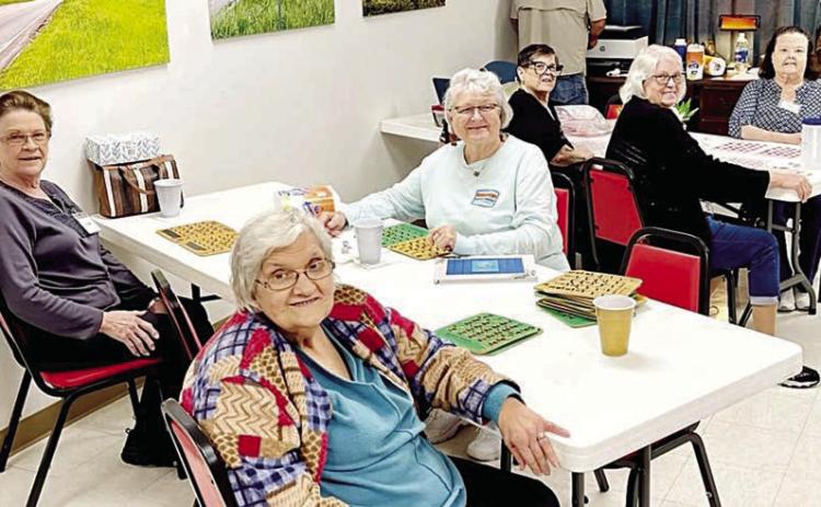 Really enjoying themselves during bingo were Cynthia Meyer, Alice Fajkus and Lillian Vanicek at the front table, and Cheri Wilson, Julie Hill and Faye Smith at the second table.