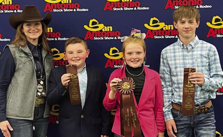 Placing ninth in livestock judging at the San Antonio Stock Show was the Fayette County 4-H Junior Maroon Team. Shown are (from left) stock show representative, Abraham McBride, Kaisley Janecka and Kullen Kutac. Not shown is Rheagan Karisch.