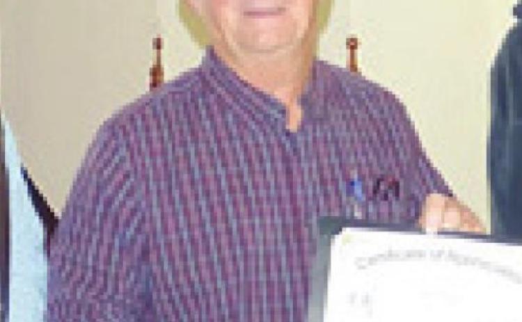 FROM THE DEC. 31 ISSUE – Tom Muras was presented a certificate of appreciation by the Commissioners Court for serving as Precinct 4 commissioner for 30 years.