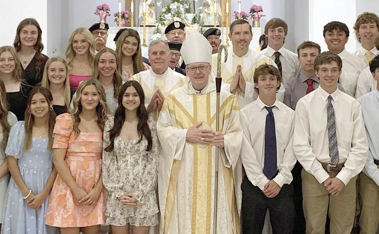 sacrament of confirmation administered at st. Rose Catholic Church