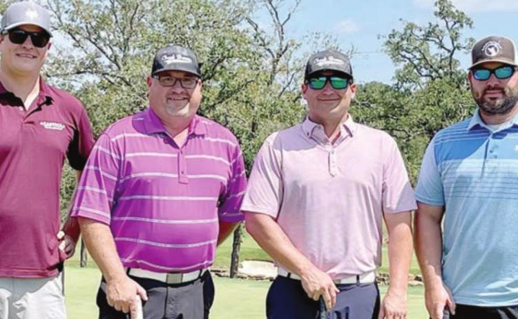GOLF TOURNEY WINNERS – Chuck Brown Ford team of (from left) Adam Besetzny, Kenny Helmcamp, Tommy Brown and Clayton Besetzny.