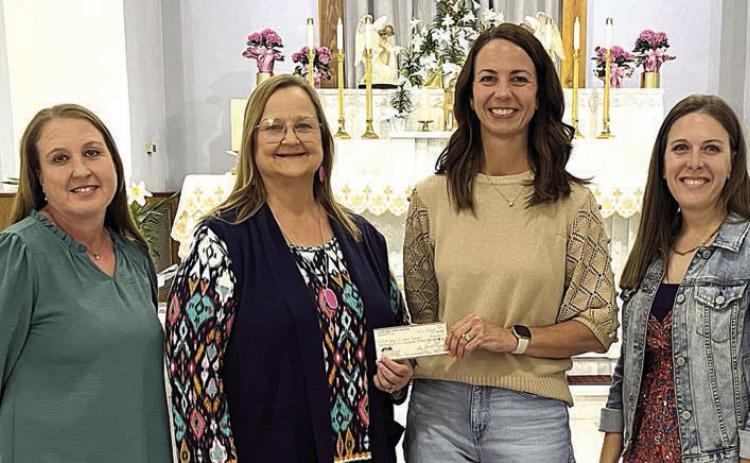 hsa gives $110,000 to st. Rose school