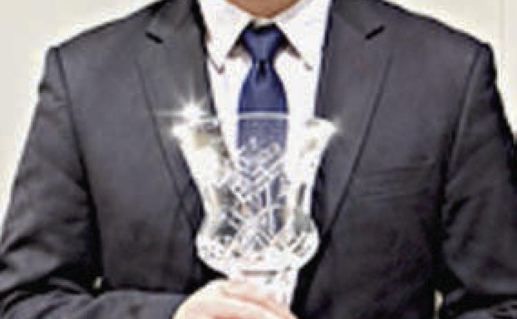 Abraham McBride earned the Texas Junior Cup trophy in livestock judging.