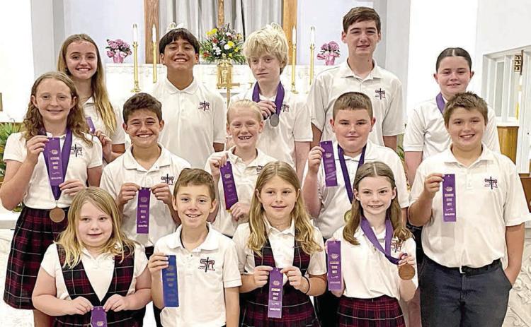 State winners – (front row, from left) Clare McCourt, Brody Lewis, Brylee Stoever, Rylee Wright, (middle row) Caroline Bartek, Cal Schiffli, Briley Hartensteiner, Abraham McBride, Noah Heger, (back row) Miranda Bonner, Maximo Hernandez, Allen Ballard, William Taylor and Charlotte Schmidt.