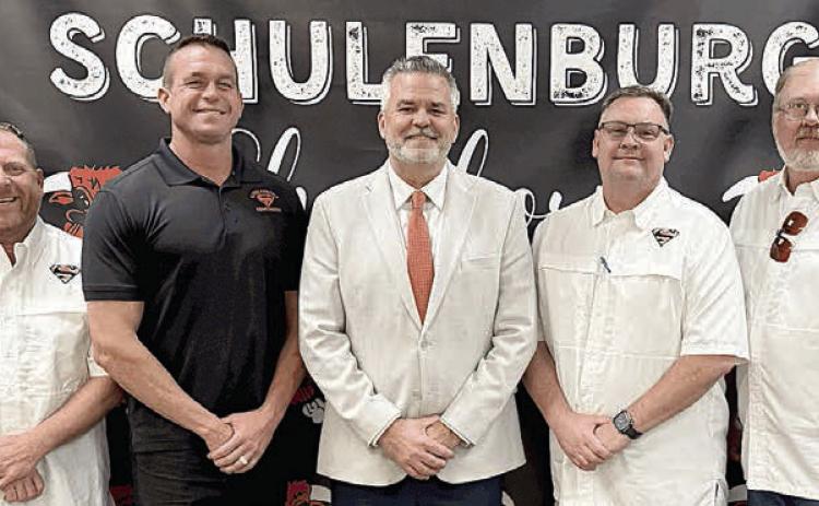 Shown with Lee Hafley (center), the lone finalist for Schulenburg ISD superintendent, are: (from left) SISD trustees Hale Hentges, Michael “Dumas” Demel, Shannon Hollas; and (from right) Joel Blansitt, Mike Zweschper, and Troy Brenek. Not pictured: Trustee Jarrod Schramek.
