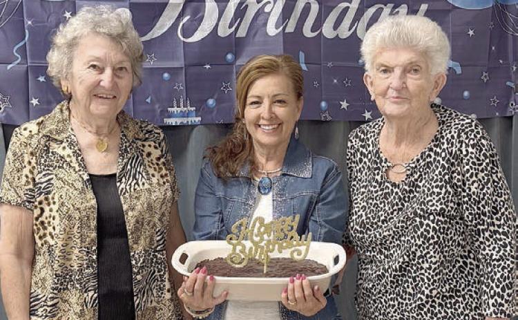 April birthday celebrants shown are (from left) Helen Janda, Martha Beckmann and Annie Mae Ripper.