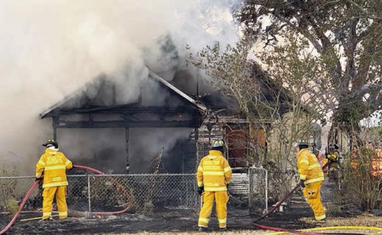 Round Top -Warr ento n firefight ers , along with firefighters from three other departments, worked the house fire on Monday, Oct. 13. Photo Courtesy of Fayette County Sheriff's Office