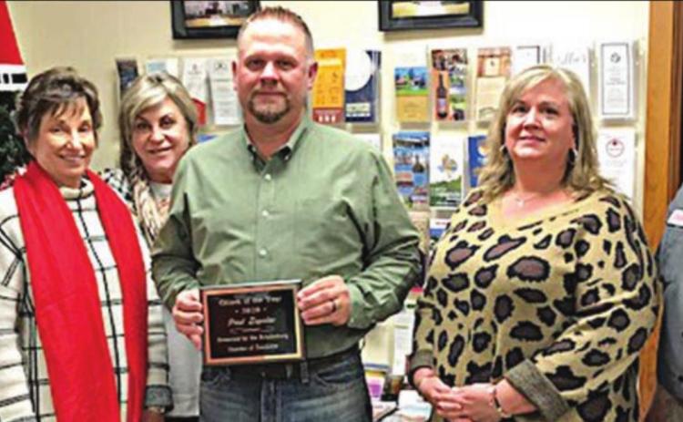 CITIZEN OF THE YEAR – Paul Zapalac (front, center) accepts the “Citizen of the Year” award from Chamber of Commerce representatives (from left) Gary Zweschper, Diana Mikesky, Jill Taber, (from right) Lukas Smrkovsky, and Ann McBride.