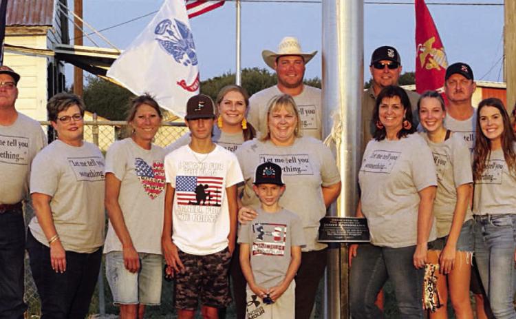 Flagpole dedicated in Brossmann’s memory at football stadium
