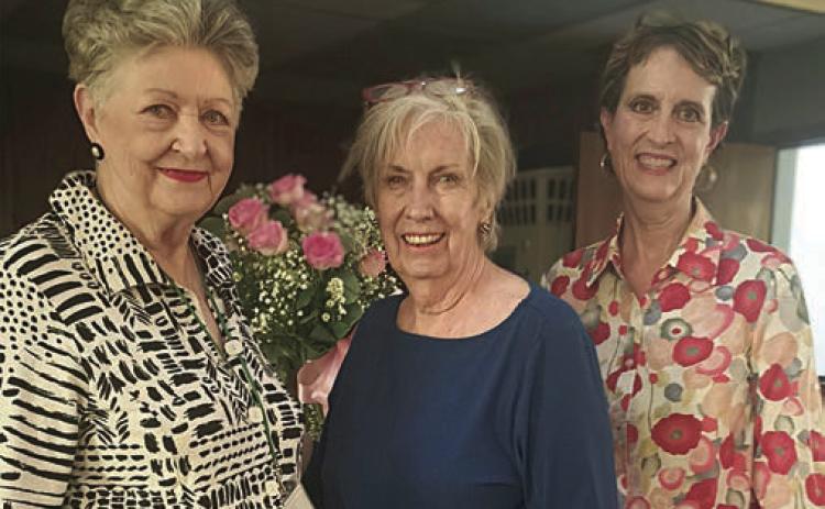 Hostesses were (from left) Patricia Greeson, Carol Archer, Lisa Dennis and (not pictured) Nancy Tinsley.
